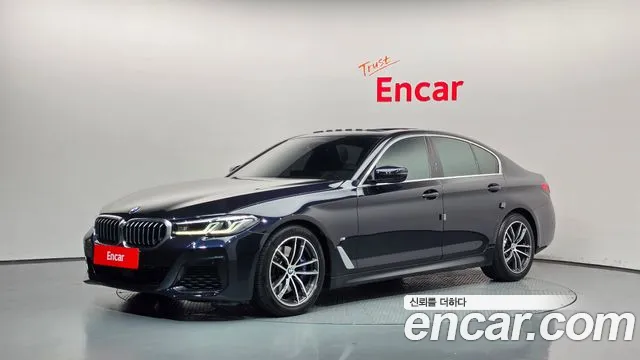 BMW 5-Series 2022 — photo 1