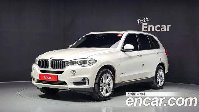 BMW X5 2015 — photo 1