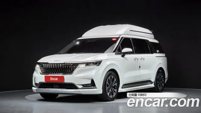 Kia Canival 2023 — photo 1