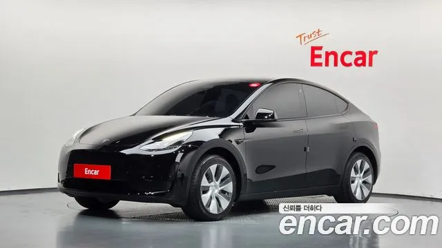 Tesla Model Y 2024 — photo 1