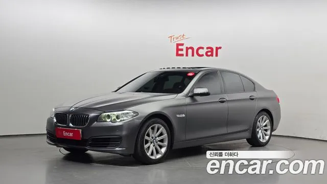 BMW 5-Series 2014 — photo 1