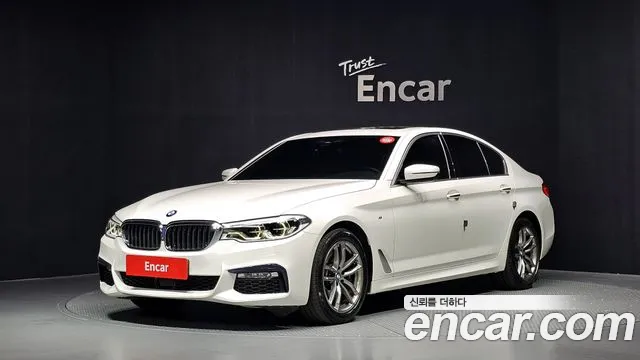 BMW 5-Series 2018 — photo 1