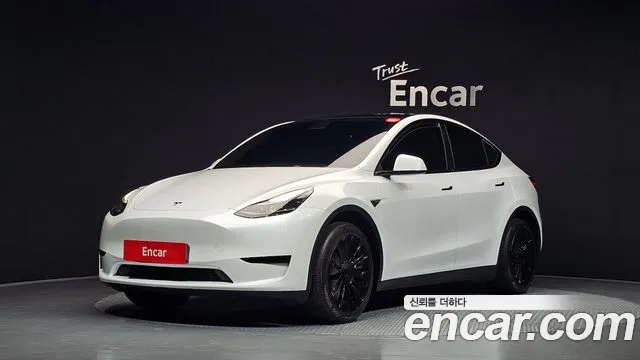 Tesla Model Y 2023 — photo 1