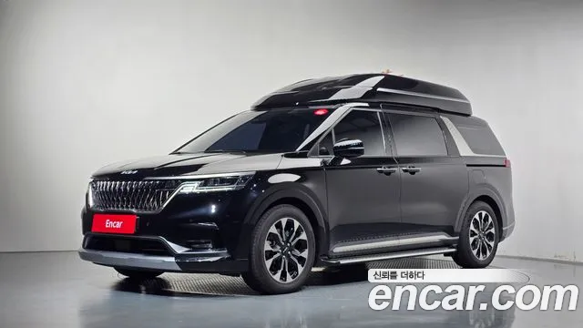 Kia Canival 2023 — photo 1