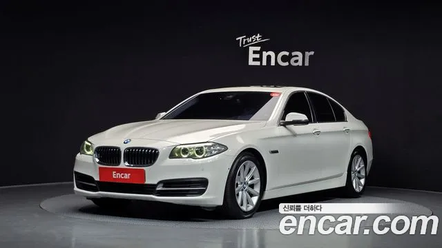 BMW 5-Series 2015 — photo 1