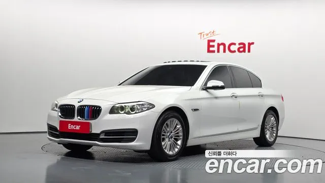 BMW 5-Series 2014 — photo 1