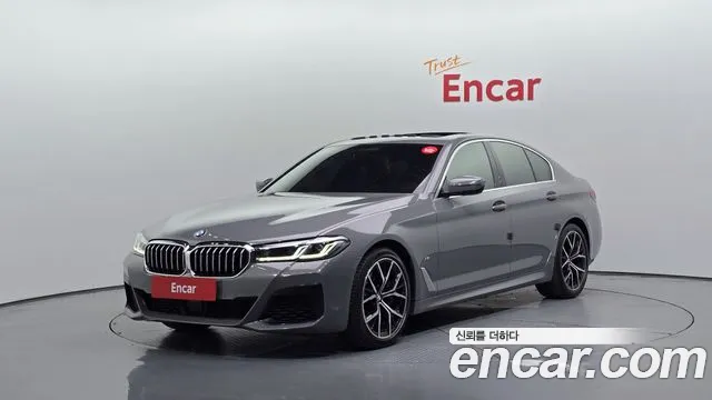 BMW 5-Series 2022 — photo 1