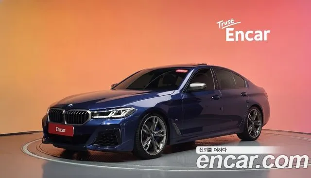BMW 5-Series 2022 — photo 1