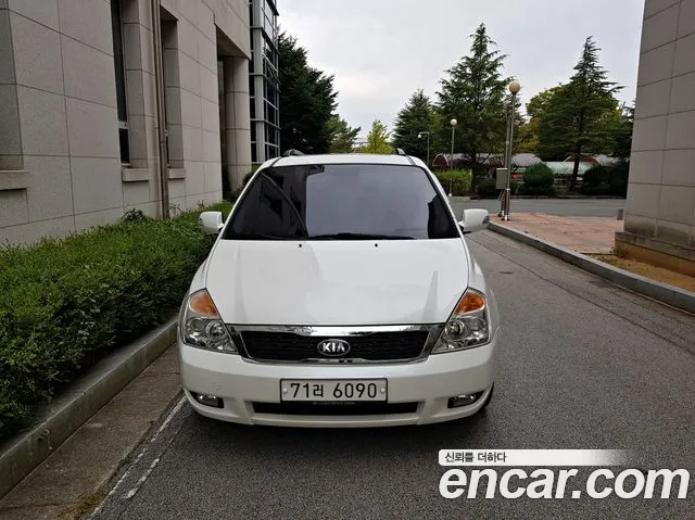 Kia Canival 2013 — photo 1