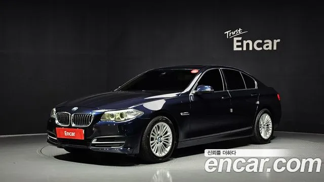 BMW 5-Series 2014 — photo 1