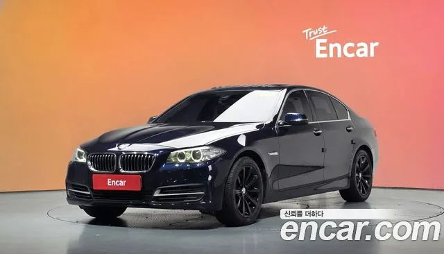 BMW 5-Series 2014 — photo 1