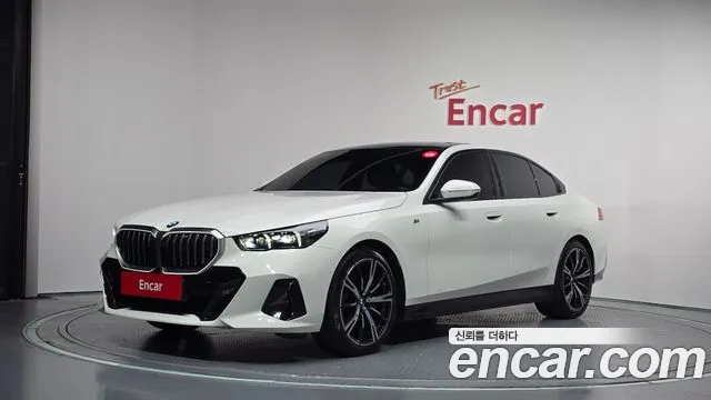 BMW 5-Series 2024 — photo 1