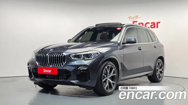BMW X5 2021 — photo 1