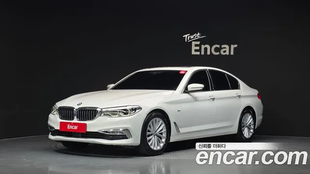 BMW 5-Series 2018 — photo 1