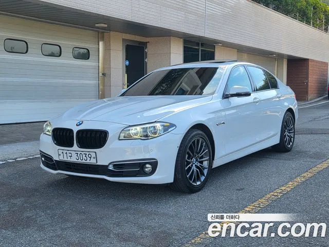 BMW 5-Series 2015 — photo 1
