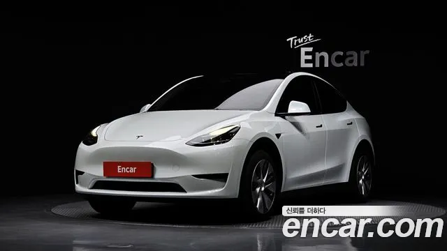 Tesla Model Y 2024 — photo 1