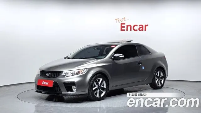 Kia Porte 2010 — photo 1