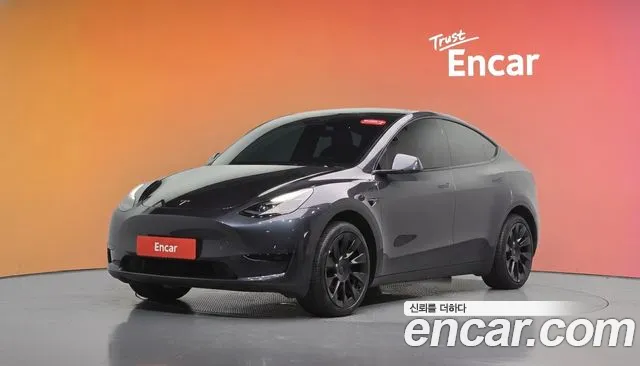 Tesla Model Y 2025 — photo 1