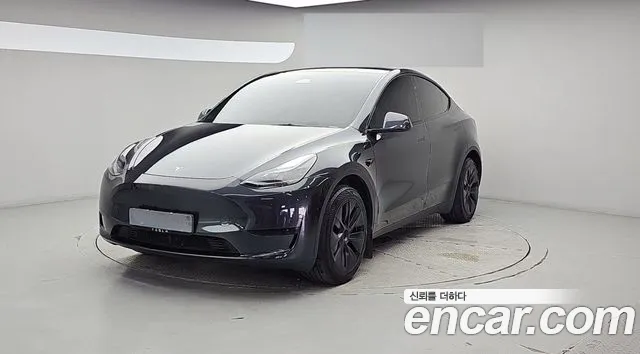Tesla Model Y 2025 — photo 1