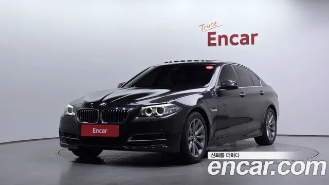 BMW 5-Series 2014 — photo 1