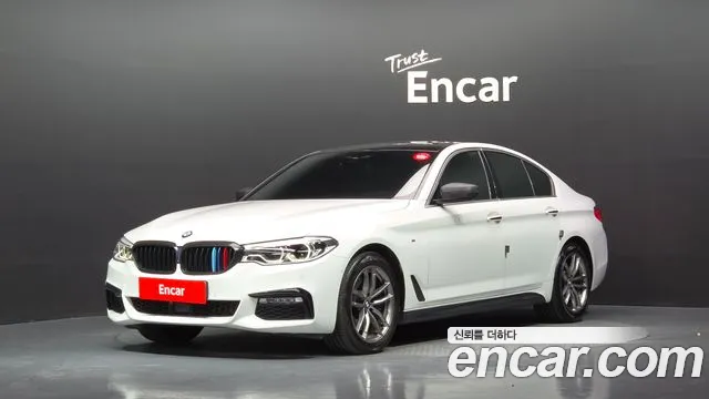 BMW 5-Series 2018 — photo 1