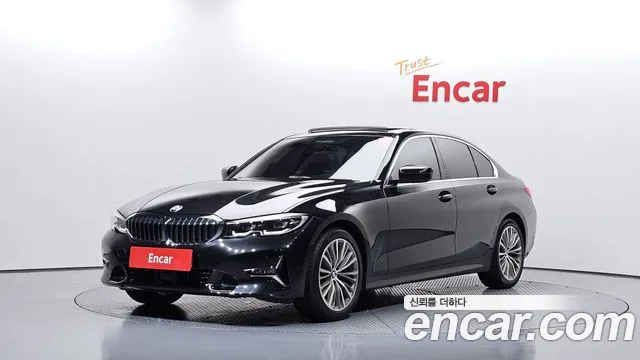 BMW 3-Series 2022 — photo 1