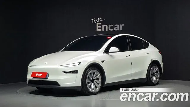 Tesla Model Y 2025 — photo 1