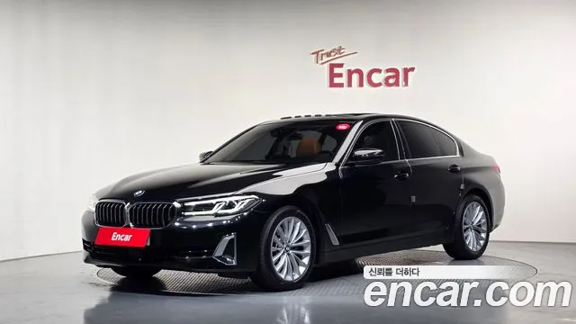 BMW 5-Series 2023 — photo 1