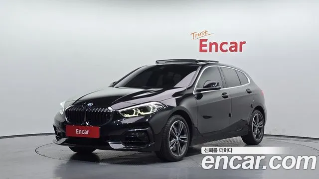 BMW 1-Series 2023 — photo 1