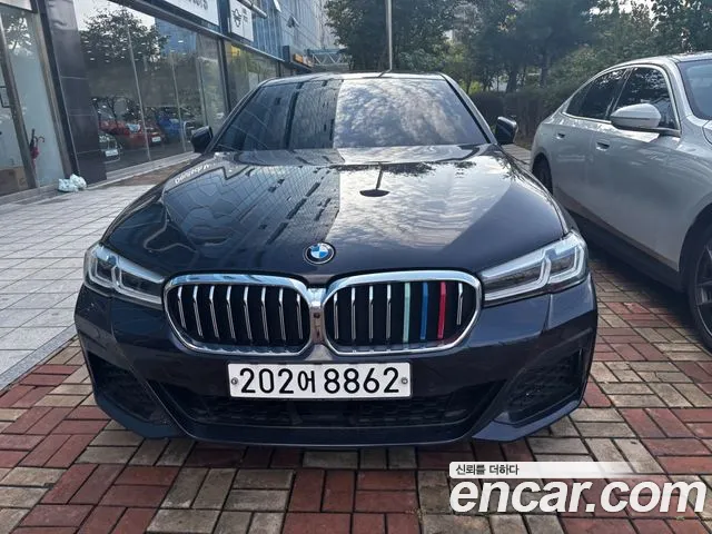 BMW 5-Series 2023 — photo 1