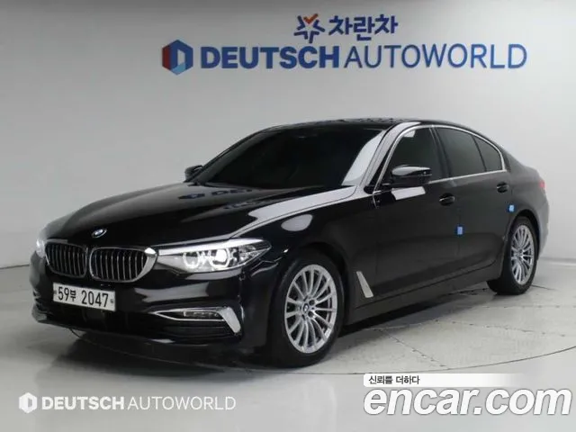 BMW 5-Series 2019 — photo 1