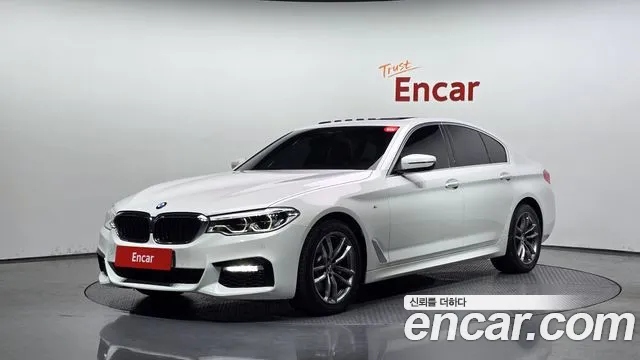BMW 5-Series 2018 — photo 1
