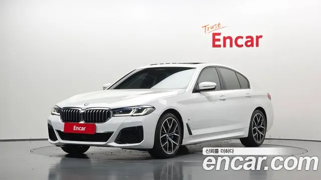 BMW 5-Series 2023 — photo 1