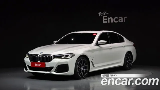 BMW 5-Series 2021 — photo 1