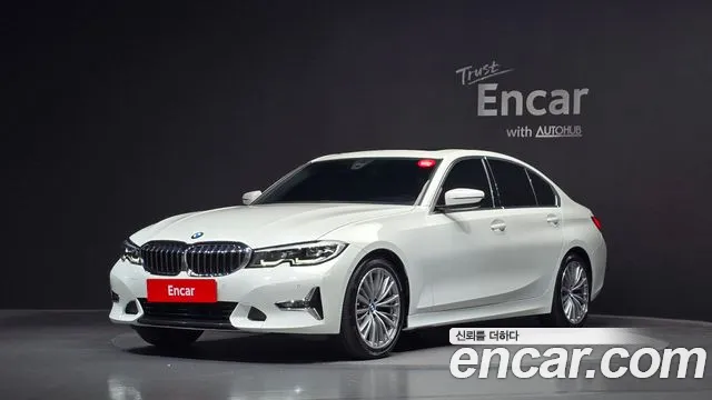 BMW 3-Series 2022 — photo 1
