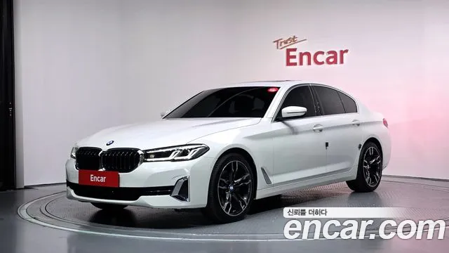 BMW 5-Series 2021 — photo 1