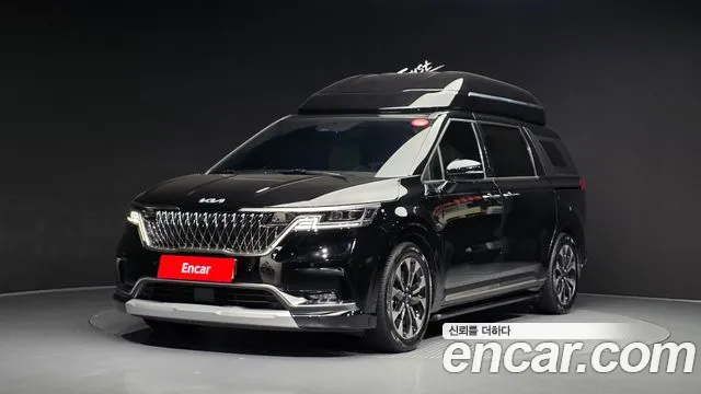 Kia Canival 2023 — photo 1