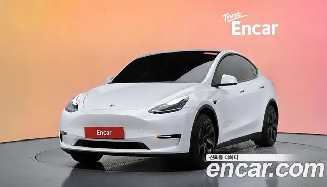 Tesla Model Y 2021 — photo 1