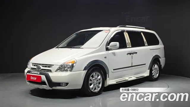 Kia Canival 2010 — photo 1