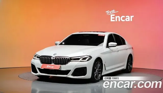 BMW 5-Series 2022 — photo 1
