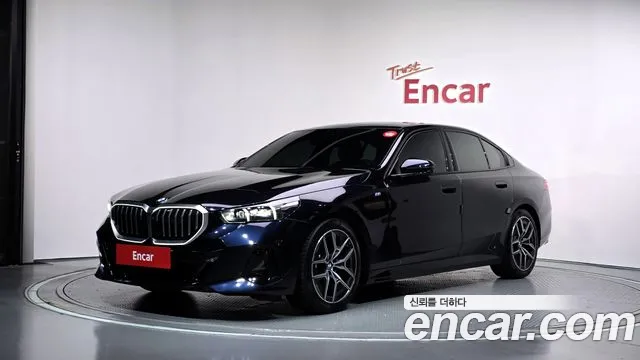 BMW 5-Series 2024 — photo 1