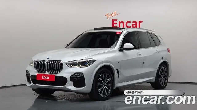 BMW X5 2021 — photo 1