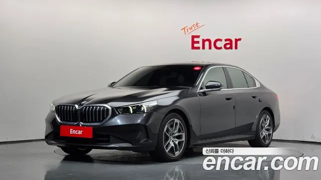 BMW 5-Series 2024 — photo 1