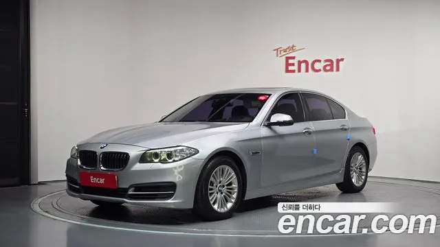BMW 5-Series 2014 — photo 1