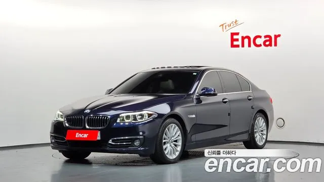 BMW 5-Series 2014 — photo 1