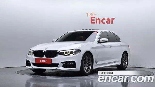 BMW 5-Series 2018 — photo 1