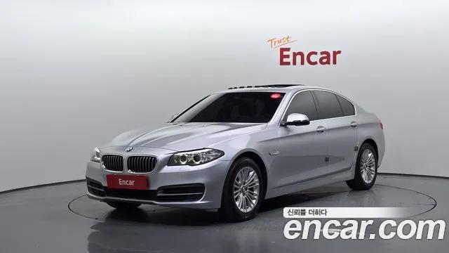 BMW 5-Series 2014 — photo 1