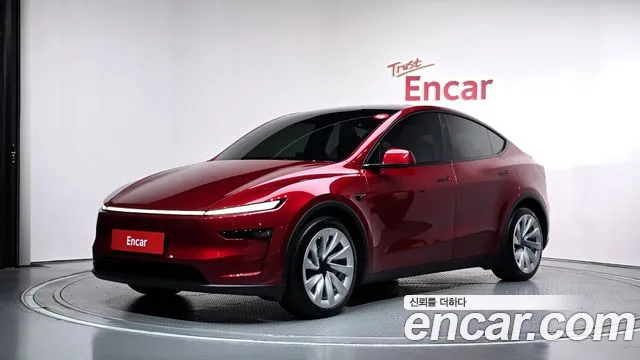 Tesla Model Y 2025 — photo 1