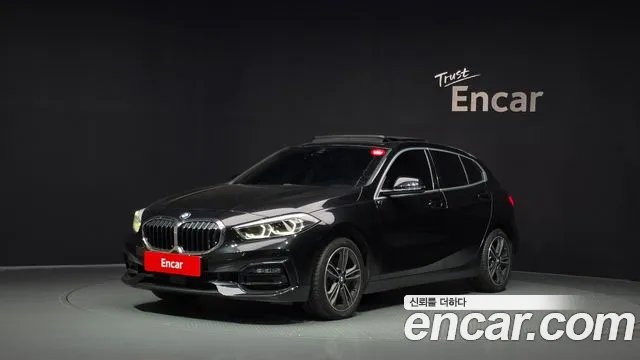 BMW 1-Series 2021 — photo 1