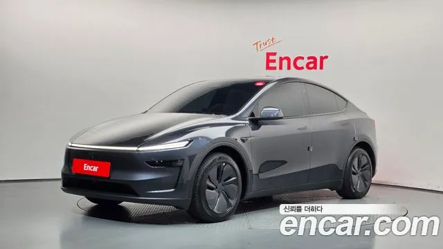 Tesla Model Y 2025 — photo 1